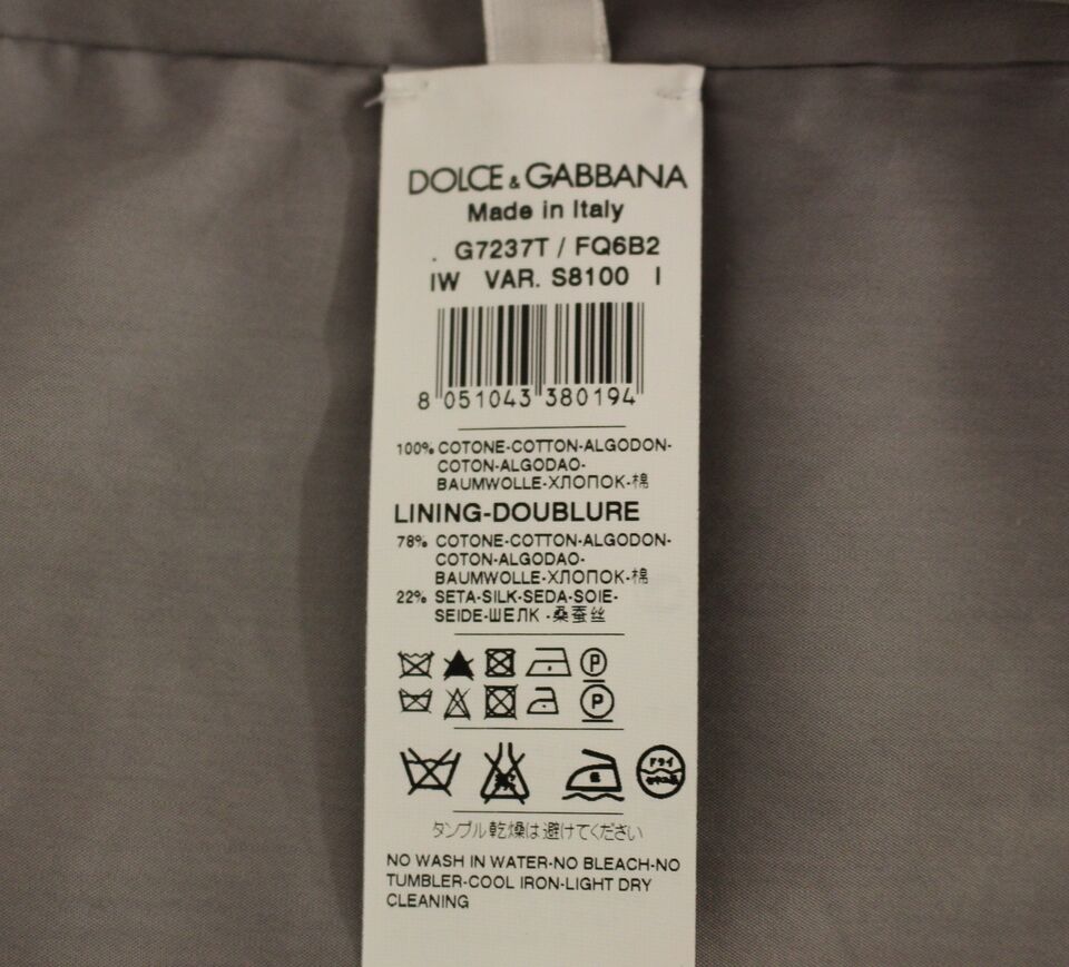 Dolce & Gabbana Grå bomullsklänning med smal passform och knappar framtill