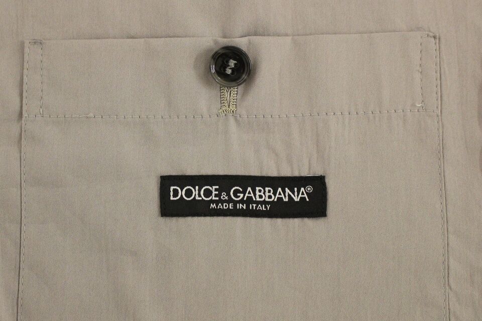 Dolce & Gabbana Grå bomullsklänning med smal passform och knappar framtill