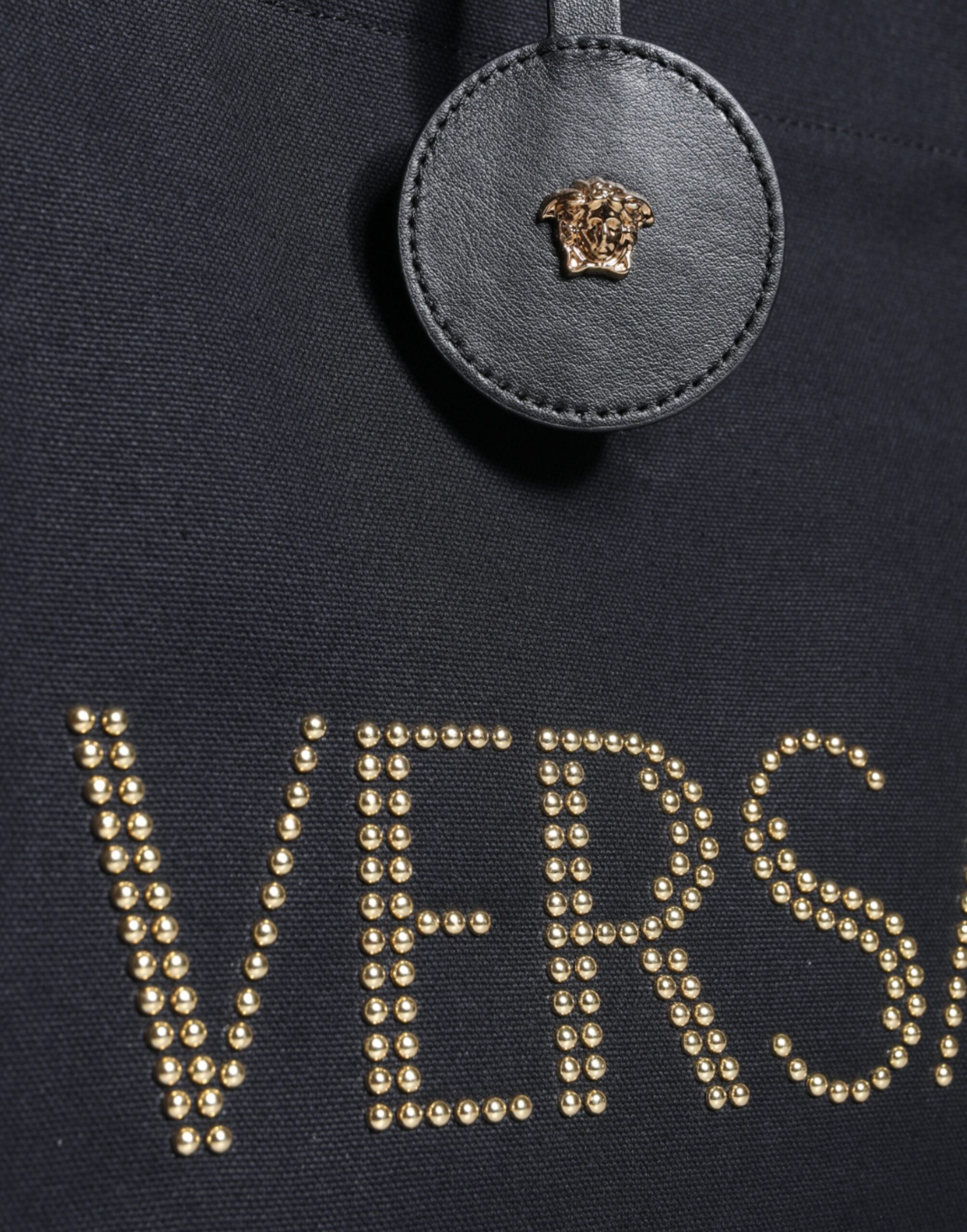 Versace svart axelväska i läder med kanvas och logotyp