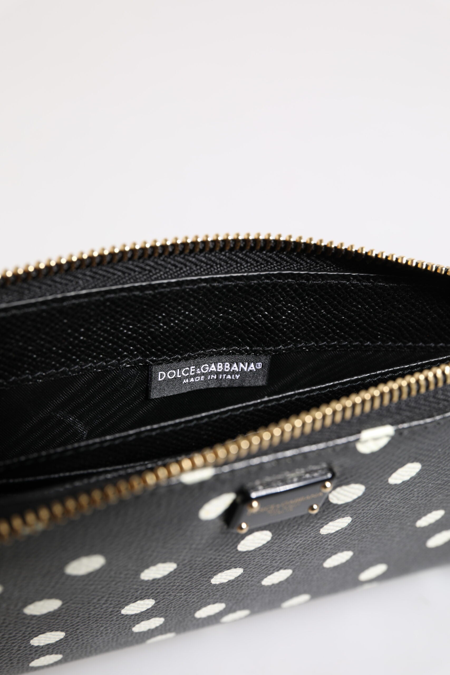 Dolce & Gabbana Svartvit Prickig Läderplånbok med Dragkedja Runt Continental