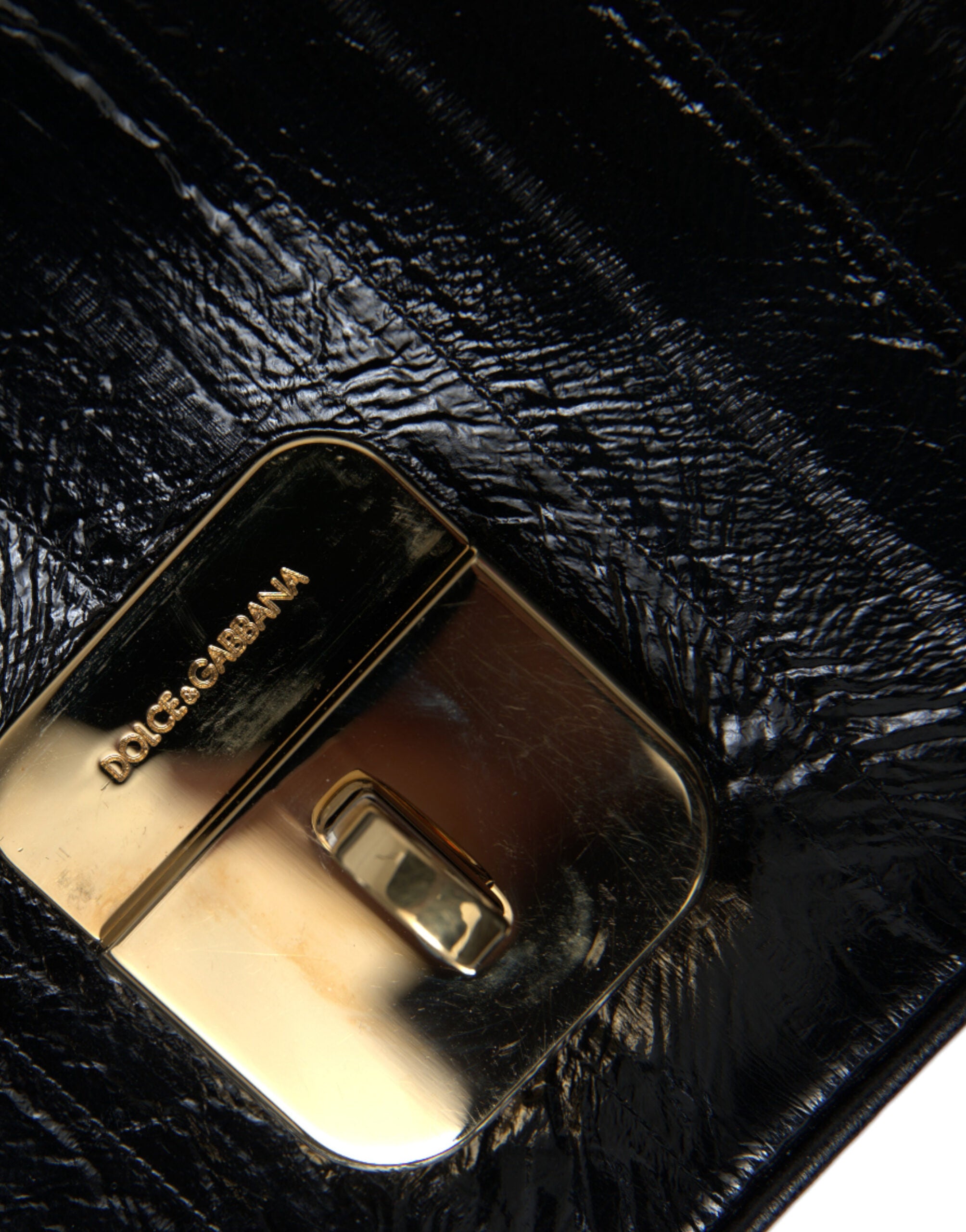 Dolce &amp;amp; Gabbana svart axelväska i läder med ålskinn och dokumentorganisering