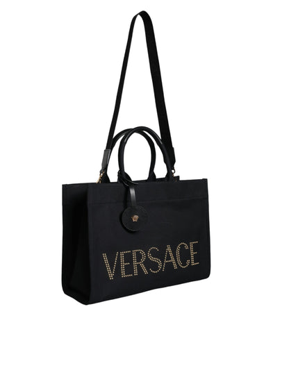 Versace svart axelväska i läder med kanvas och logotyp