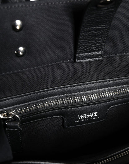 Versace svart axelväska i läder med kanvas och logotyp