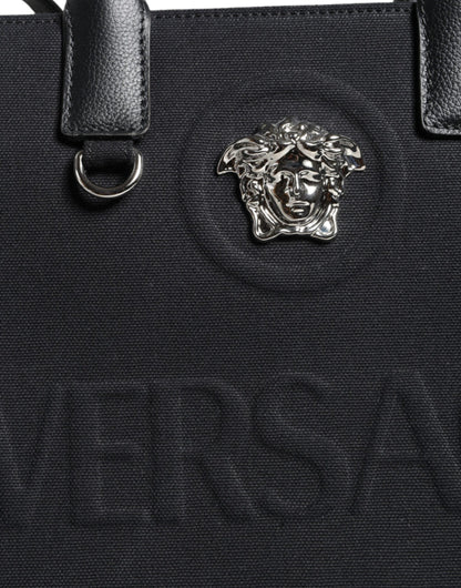 Versace svart axelväska i läder med kanvas och logotyp