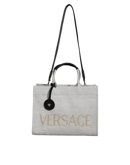 Versace Vit Axelremsväska i läder med topphandtag och logotyp