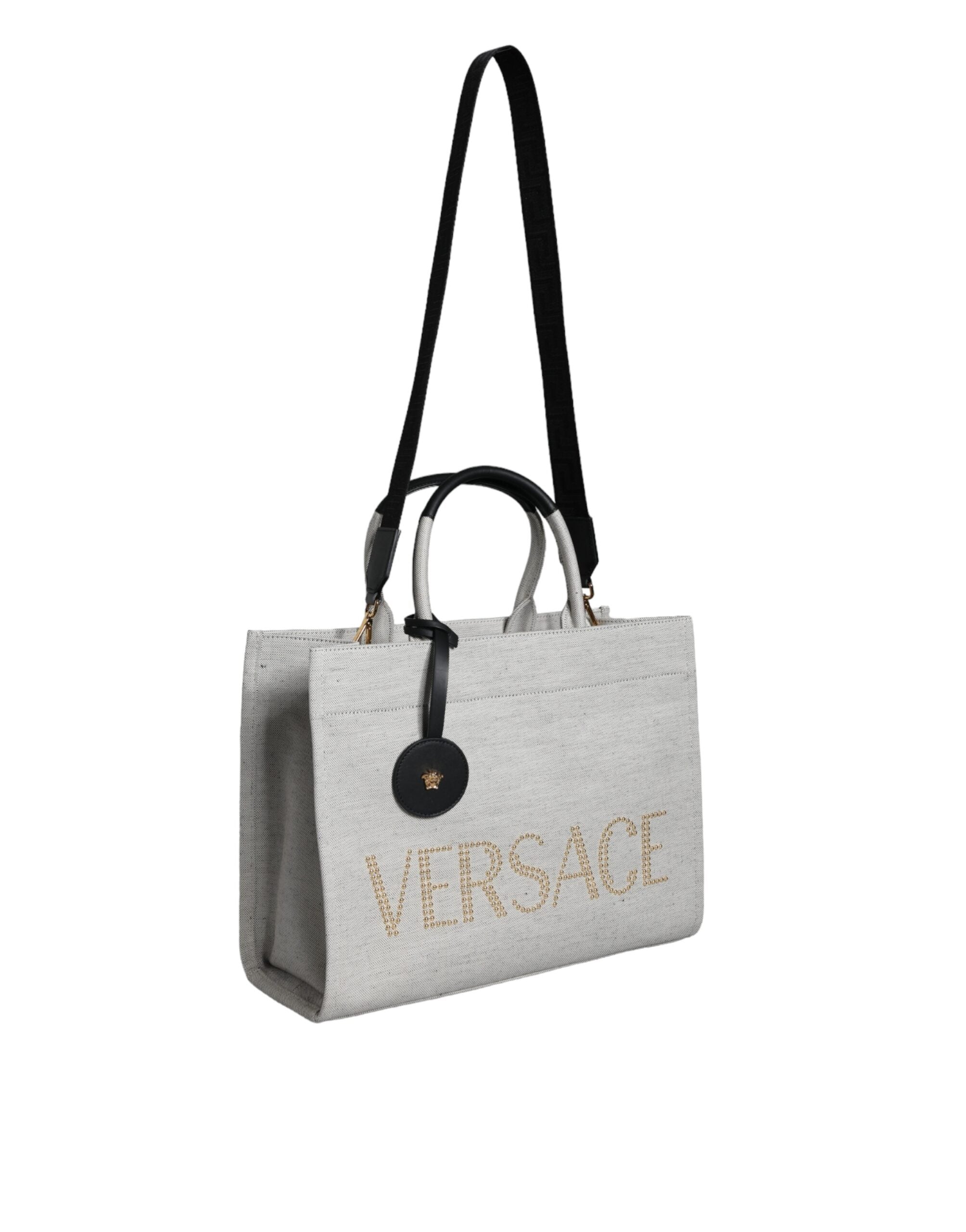 Versace Vit Axelremsväska i läder med topphandtag och logotyp