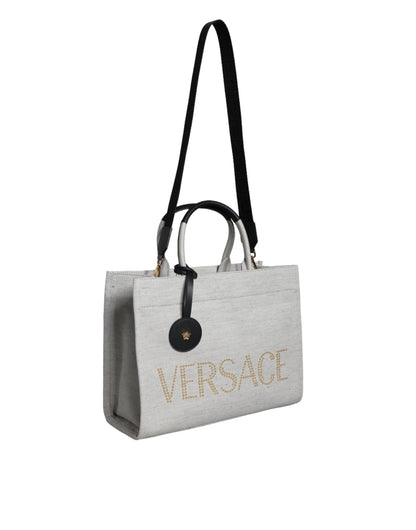 Versace Vit Axelremsväska i läder med topphandtag och logotyp