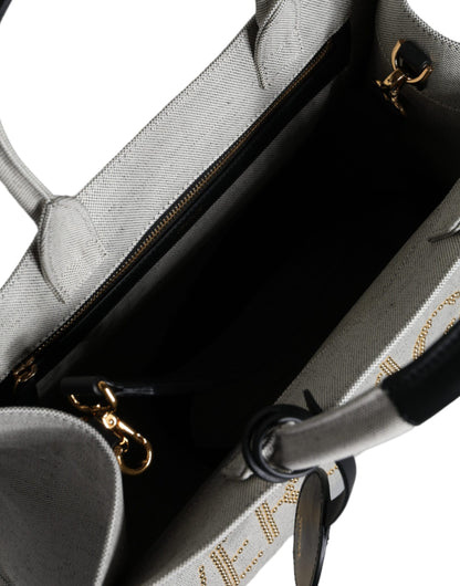 Versace Vit Axelremsväska i läder med topphandtag och logotyp