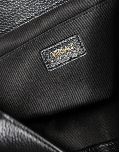 Versace svart axelväska med kornigt kalvskinn och topphandtag