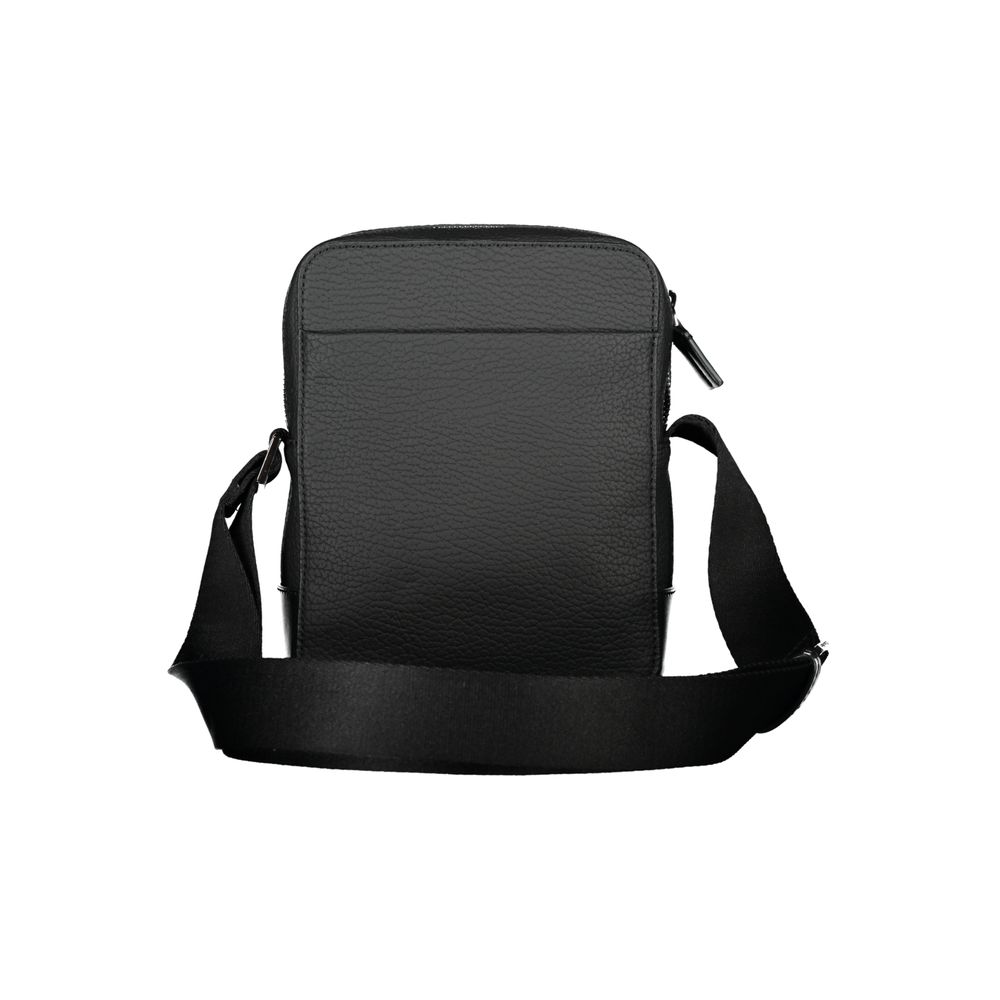 Calvin Klein Sleek svart axelväska med kontrasterande detaljer