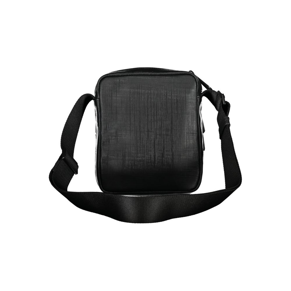 Calvin Klein elegant svart axelväska med kontrasterande detaljer