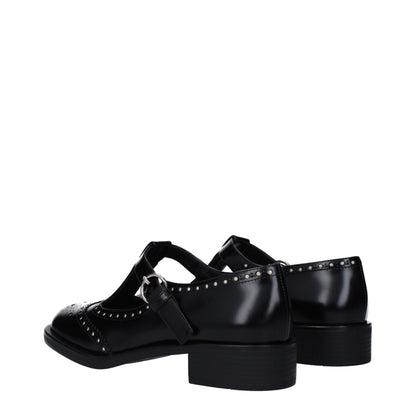 Miu Miu svarta slip-on loafers i läder